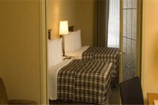 Merit Hotel & Suites