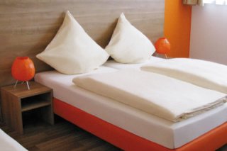 Orange Hotel und Apartments